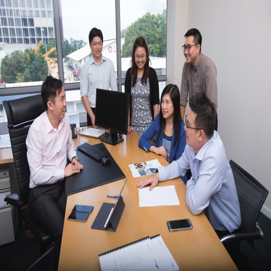 Weiseong Fong in a meeting