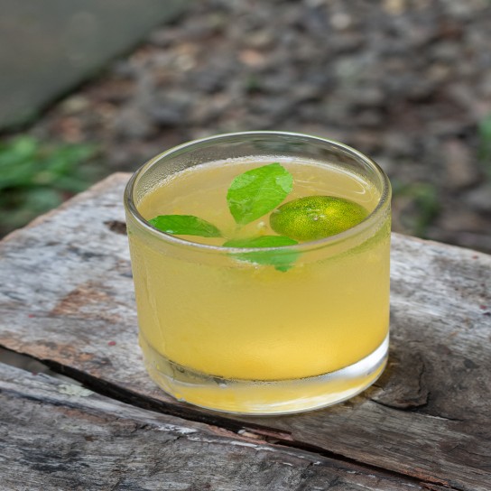 Close up drinks made from itrus amblycarpa, small orange fruit that tends to have a sour taste but refreshing to make drinks or add a natural flavor to the dish