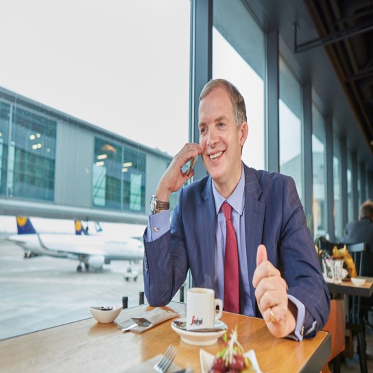 Jon Birrel having breakfast at the airport